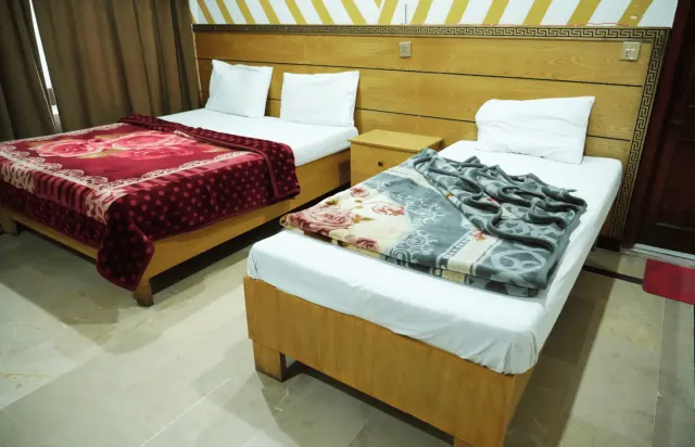 One Room, Two Bed Styles