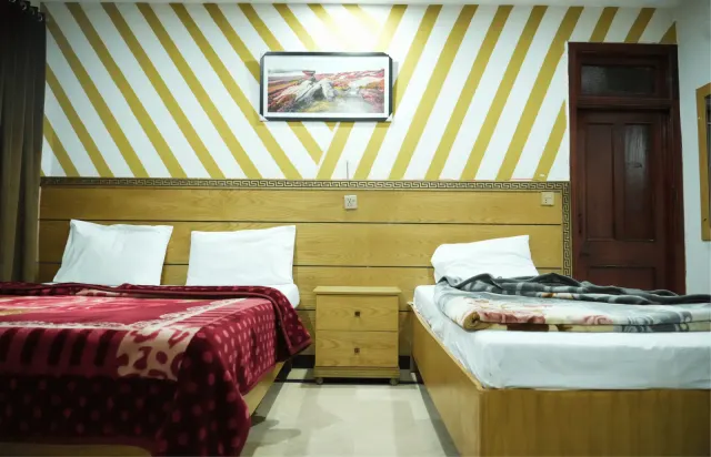 One Room, Two Bed Styles