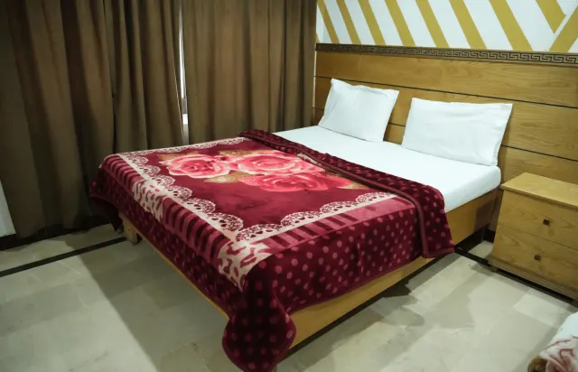 One Room, Two Bed Styles