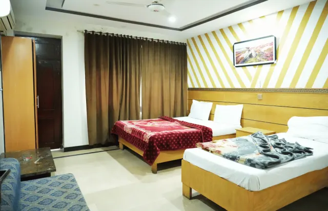 One Room, Two Bed Styles